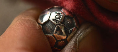 Trollbeads silver Football Passion bead being polished